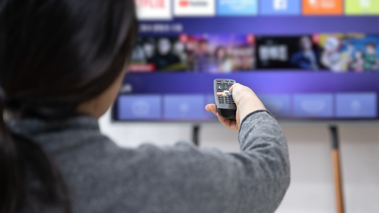 person watching smart TV